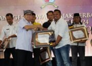 Bertabur Penghargaan di Anugerah Wajib Pajak Terbaik dan Desa Teraktif 2024 Kabupaten Bojonegoro